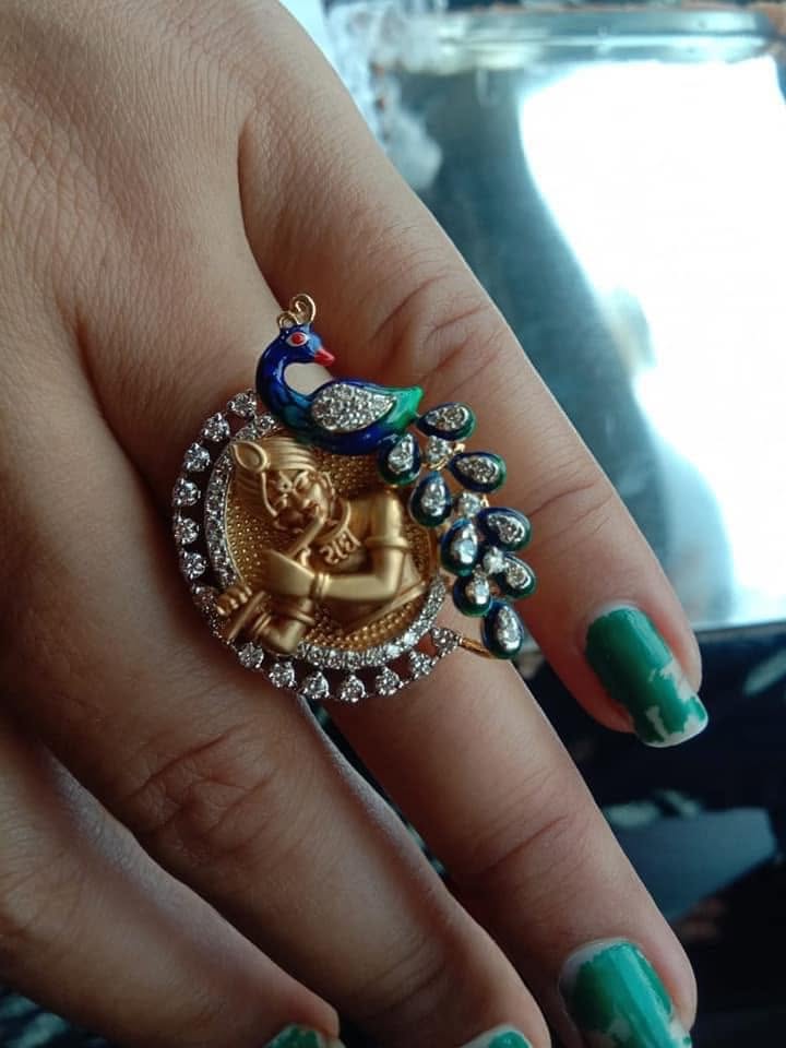 Devotional jewellery with peacock detail